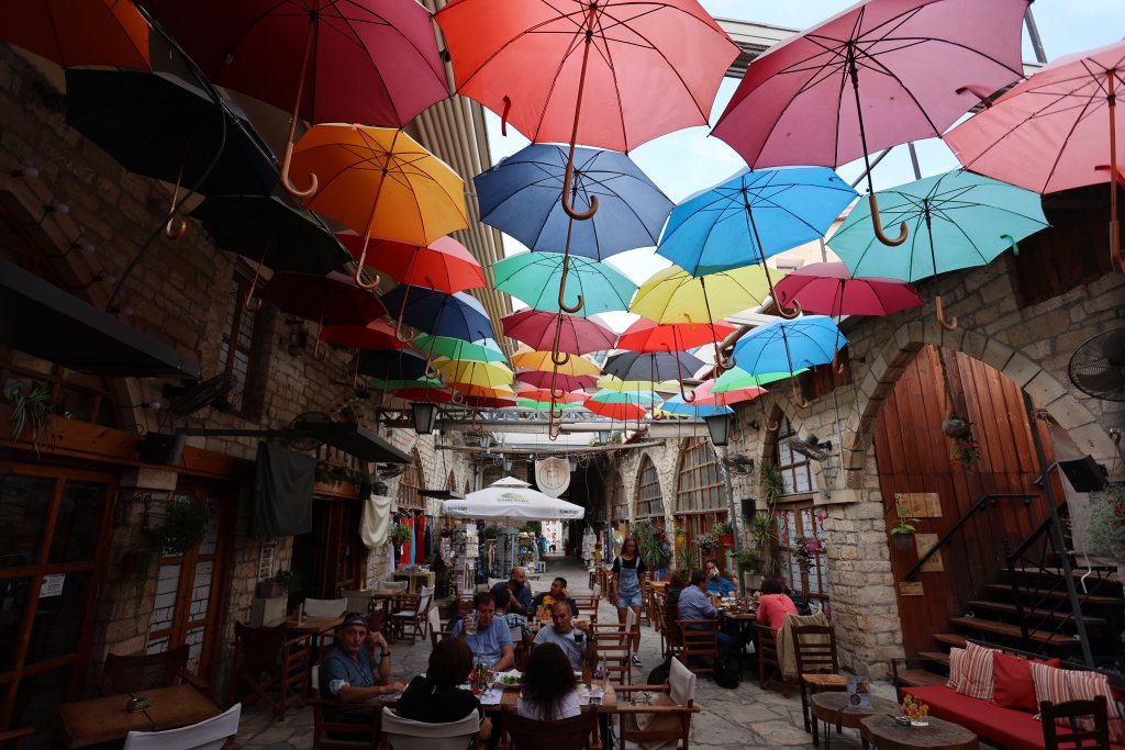 Colourful umbrellas provide shade in Limassol old town.