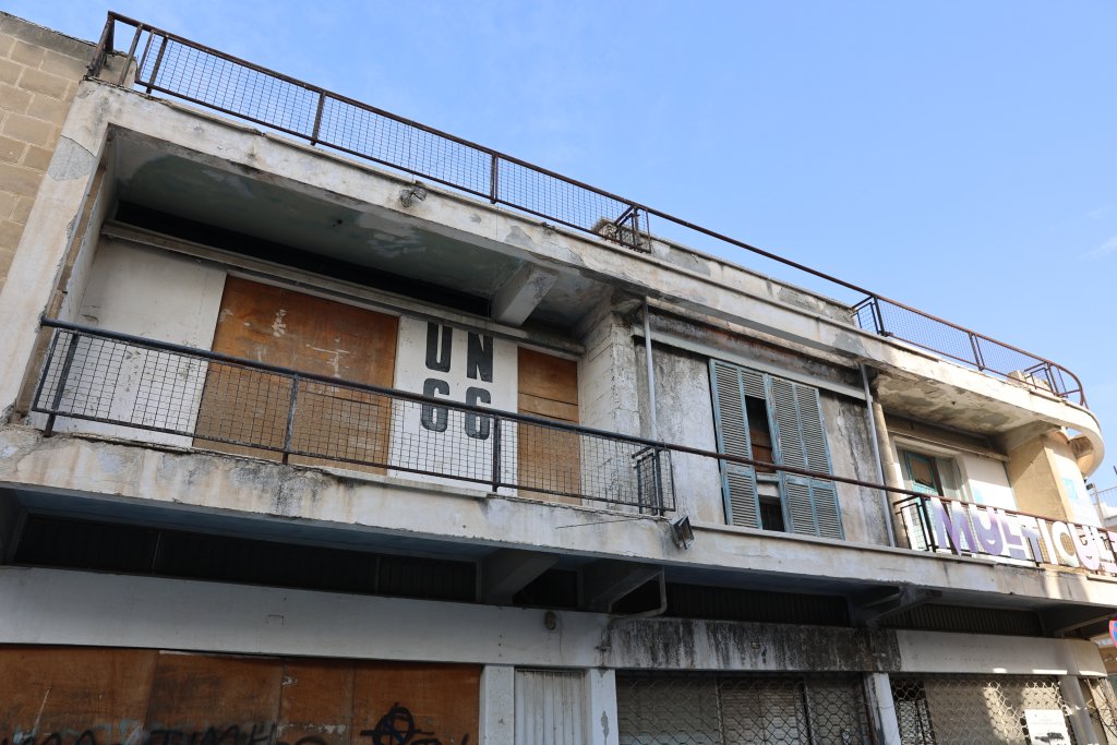 Former apartments in Nicosia, which are located on the "Green Line", lie abandoned in no-mans land.