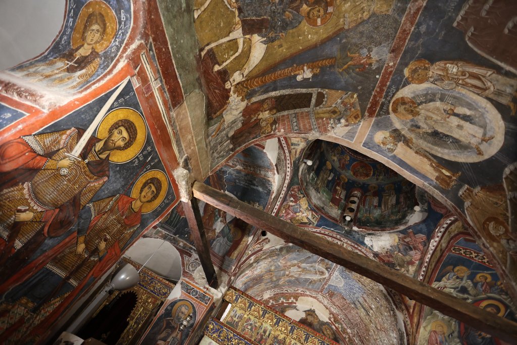 The interior walls of the Church of St. Nicholas of the Roof are adorned with a series of frescoes which were painted over 600 years.
