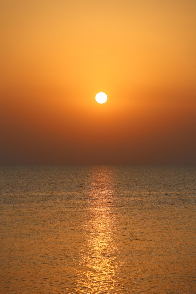 A view of the sunset from the Cavo Greco National Park.