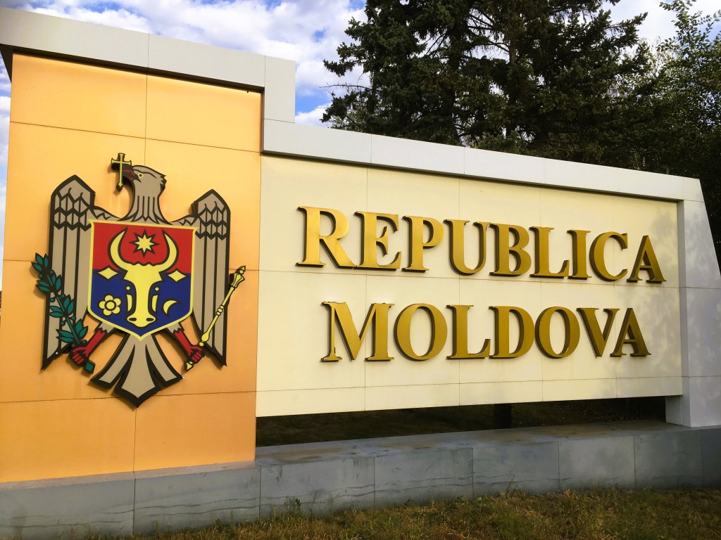 A welcome to Moldova sign at the border crossing between Romania and Moldova.