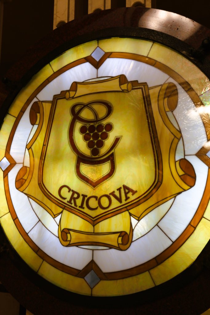 A "Cricova" stained glass window illuminates the subterranean world at the winery.