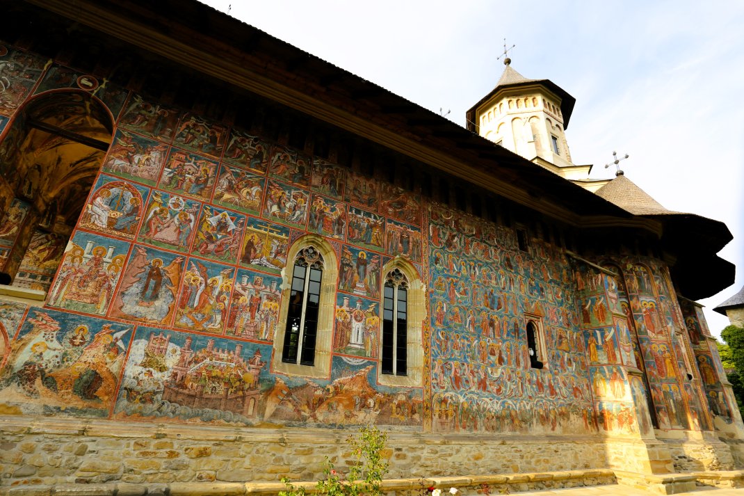 The predominantly gold and deep blue exterior murals at the Moldovița Monastery were completed in 1537.