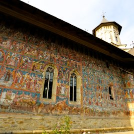 The predominantly gold and deep blue exterior murals at the Moldovița Monastery were completed in 1537.