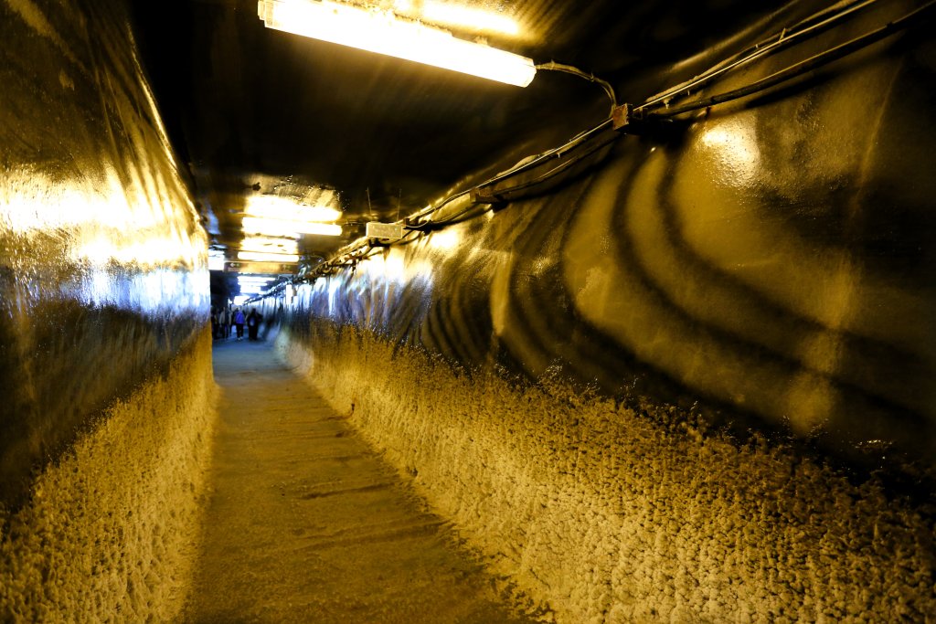 The slick, polished, salt-stone walls of the Salina Turda salt mine look more like polished marble.