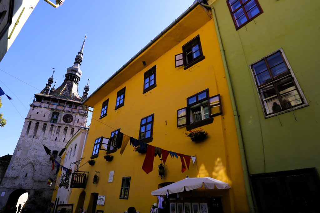 The yellow house is the birthplace of Vlad Dracul, who was better known as "Vlad the Impaler", the historical character who inspired Bram Stoker's "Dracula".