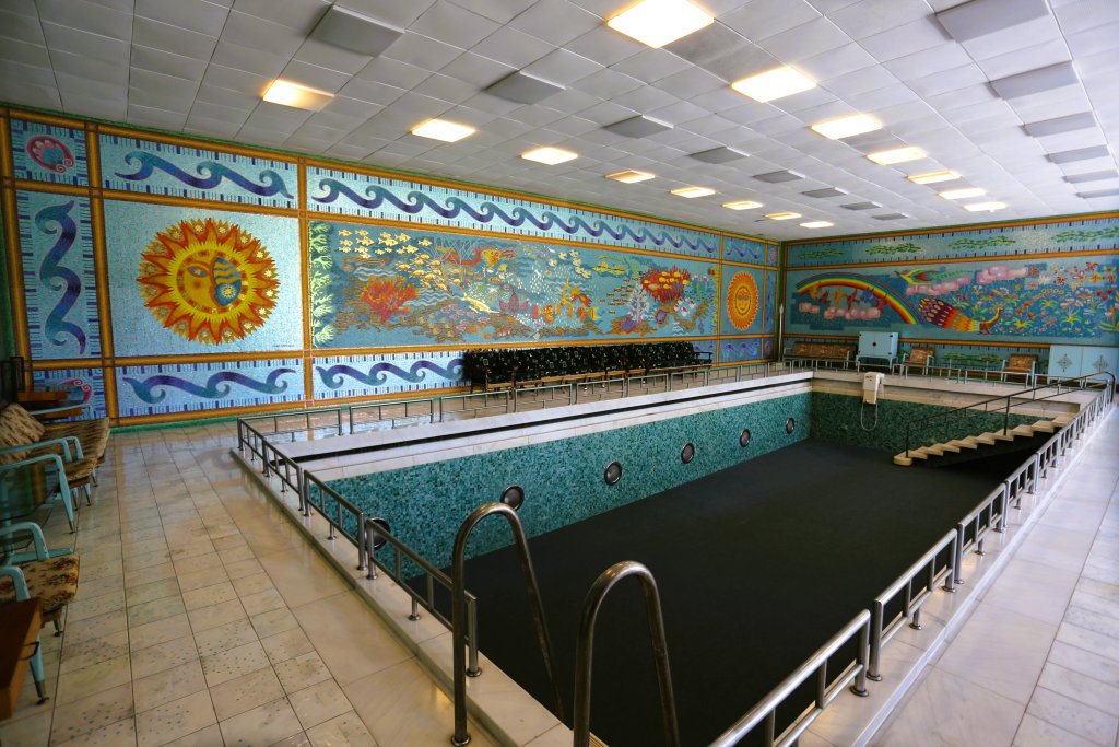 The former President's residence features an indoor swimming pool which is surrounded by marine-themed tile mosaics.