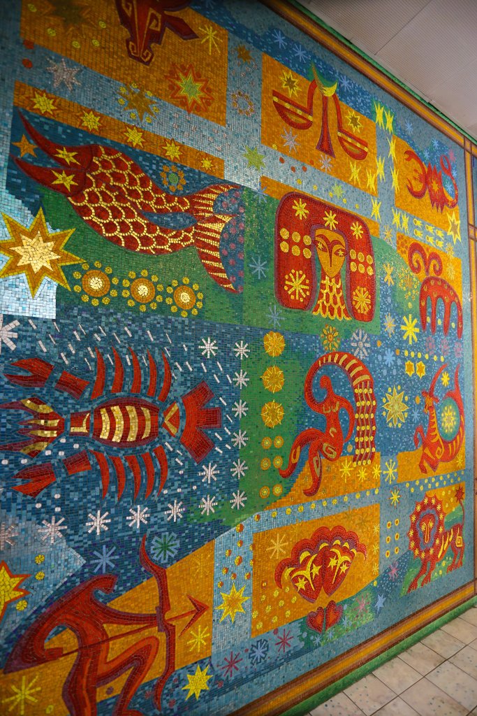 Detail of the tile mosaics which line the walls of the room which houses the indoor swimming pool at the Primaverii Palace in Bucharest.