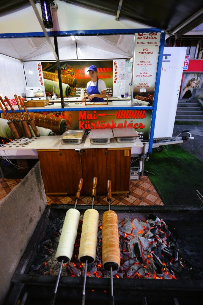 Kürtőskalács is a traditional Hungarian pastry that's also popular in Romania and is also known as chimney cake.