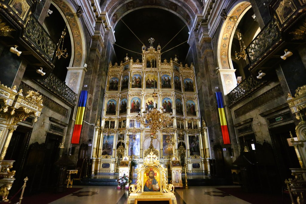 A view of the interior, and the towering iconostasis, of the Metropolitan Cathedral in Iași, Romania.