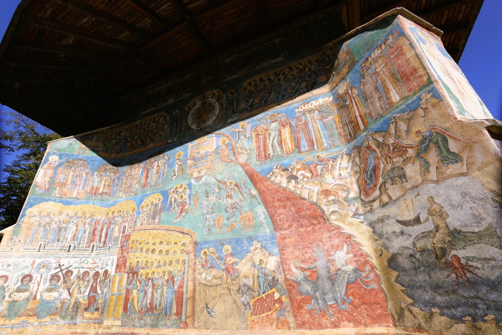 The dramatic "Last Judgement" fresco adorns the western wall of Voronet Monastery, Romania.