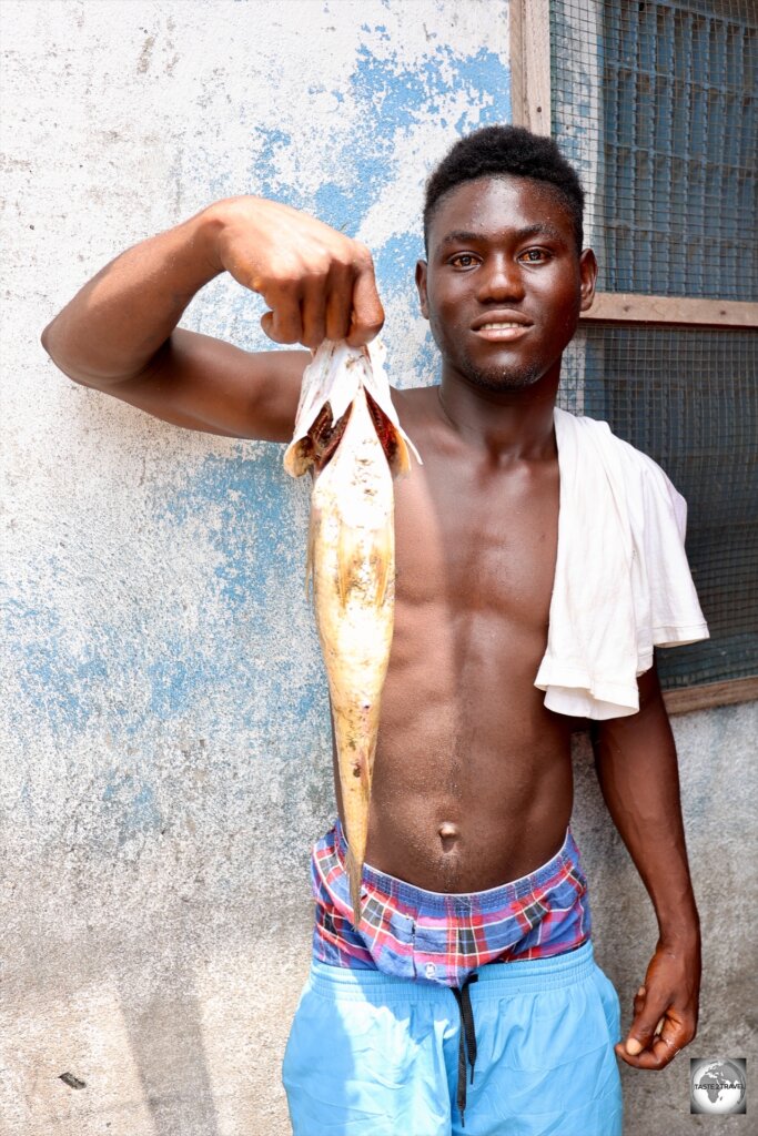 A proud fisherman in West Point, the largest slum in Liberia.