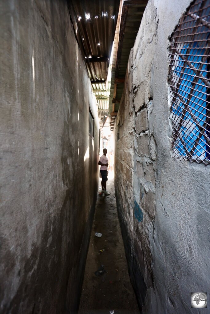 Windell King, leading me through one of the narrow laneways in West Point.