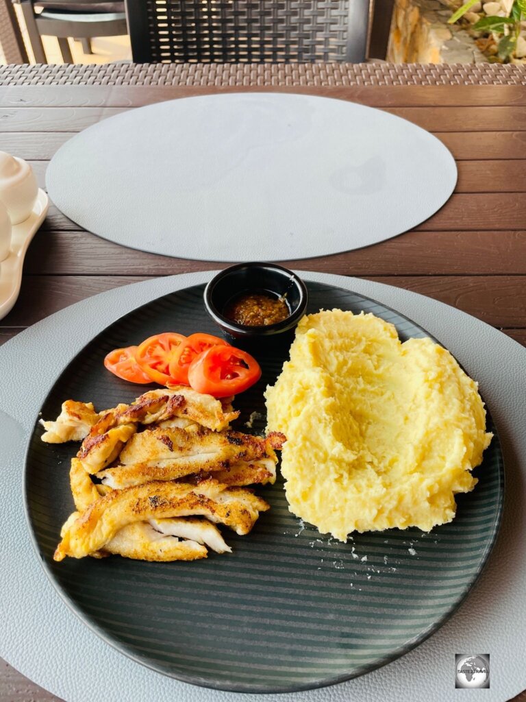A tasty lunch of grilled fresh fish and mashed potato at The Cape Hotel in Monrovia.