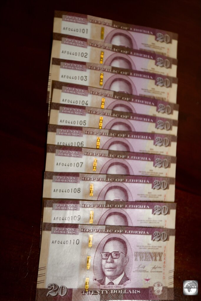 A small selection of my uncirculated Liberian dollar banknotes, in numerical order.