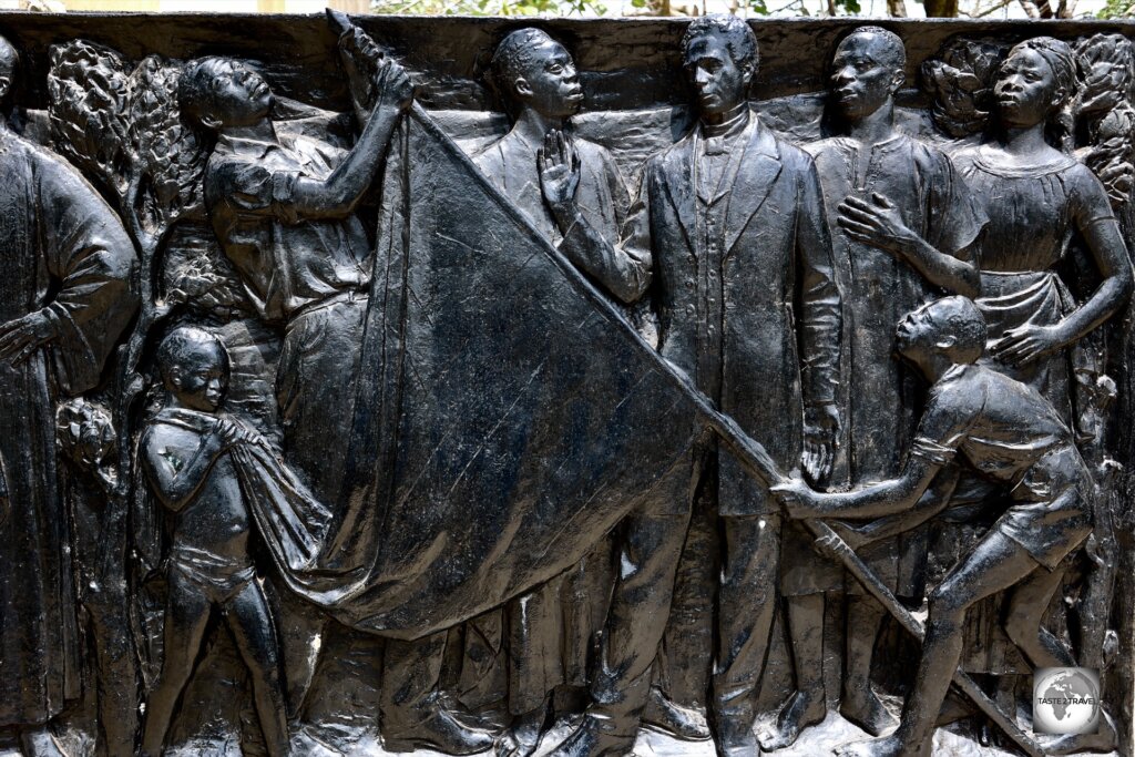 Bronze relief plates at the Joseph J. Roberts Monument depict the life of Liberia's first president.