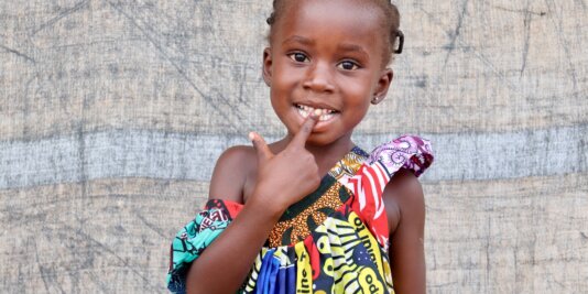 One of the cute inhabitants of The friendly inhabitants of "Camp île Bongo Soua", a refugee camp on the banks of the Ubangi River.