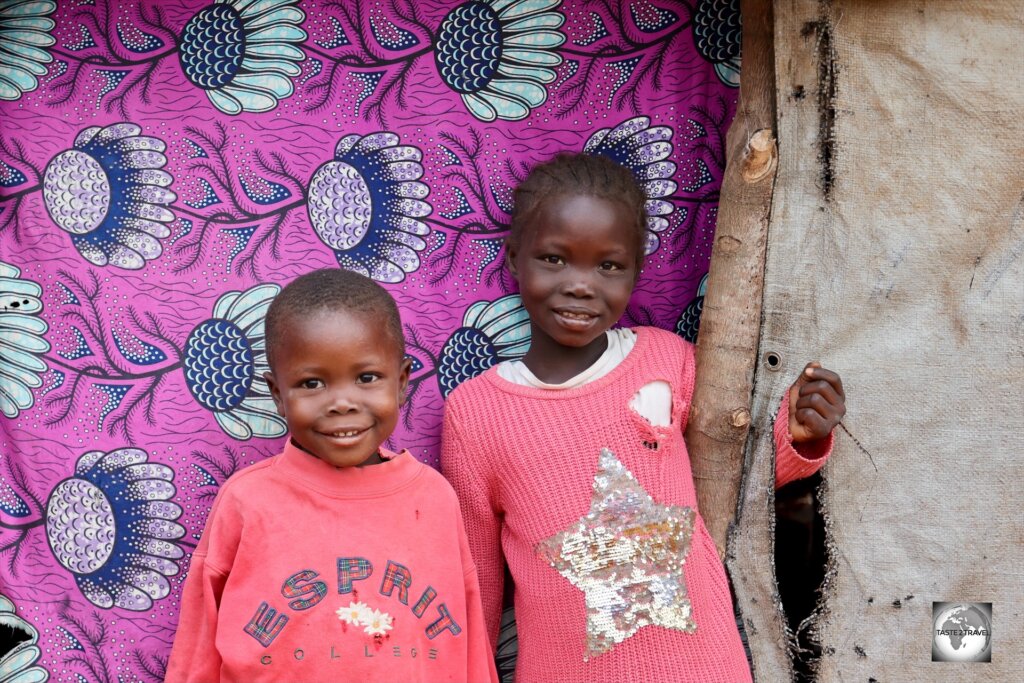 The friendly inhabitants of "Camp île Bongo Soua", a refugee camp on the banks of the Ubangi River.