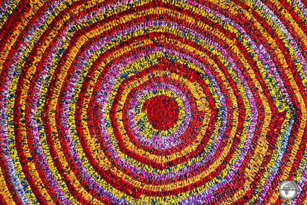 A stunning rug, braided using local fabric, which was made by the talented artisans at Ndara.