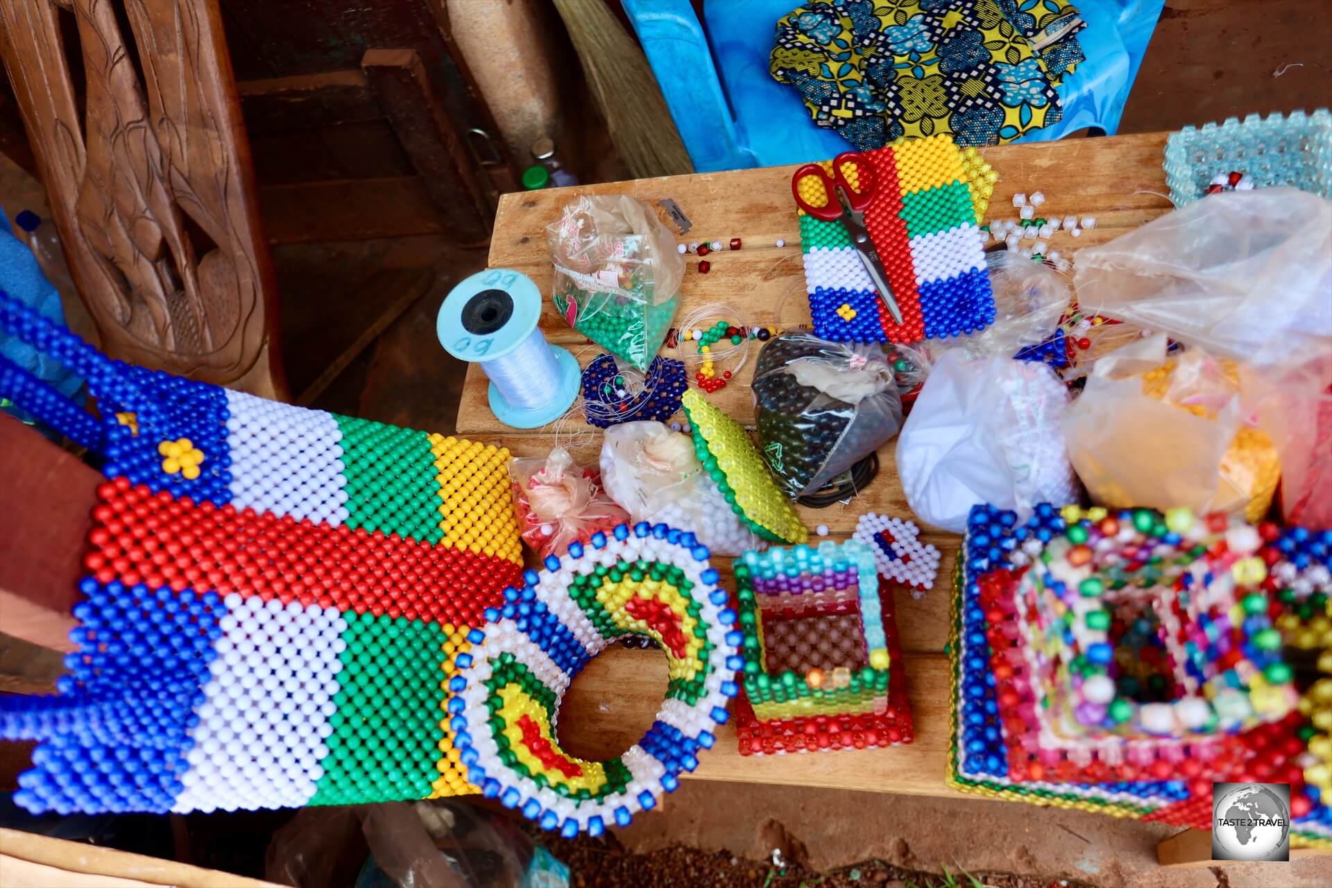 Bead work souvenirs at the Centre Artisanal are very popular, especially those which depict the national flag of the CAR.