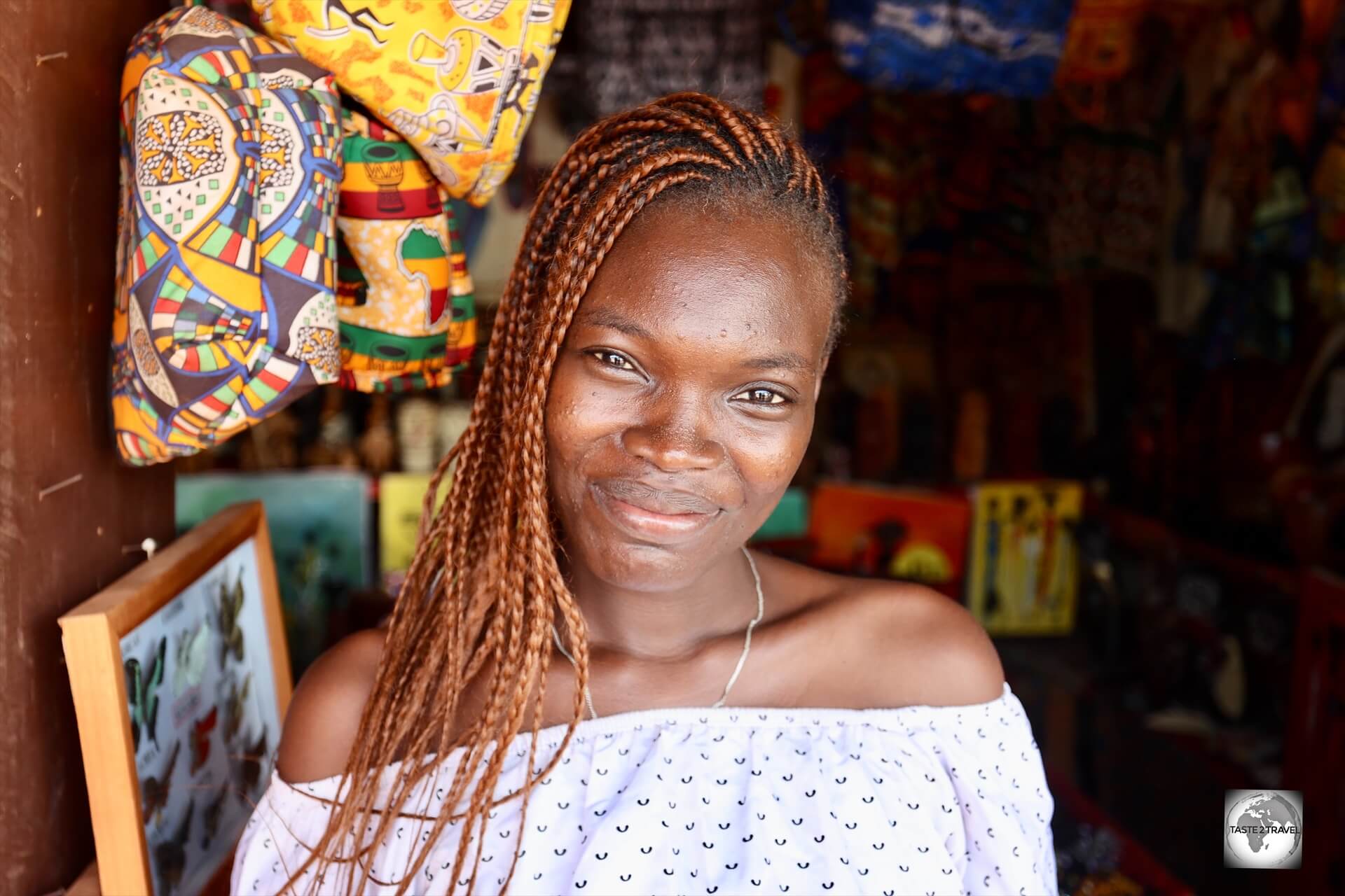 A friendly shop owner at the Artisanal Market in Bangui.