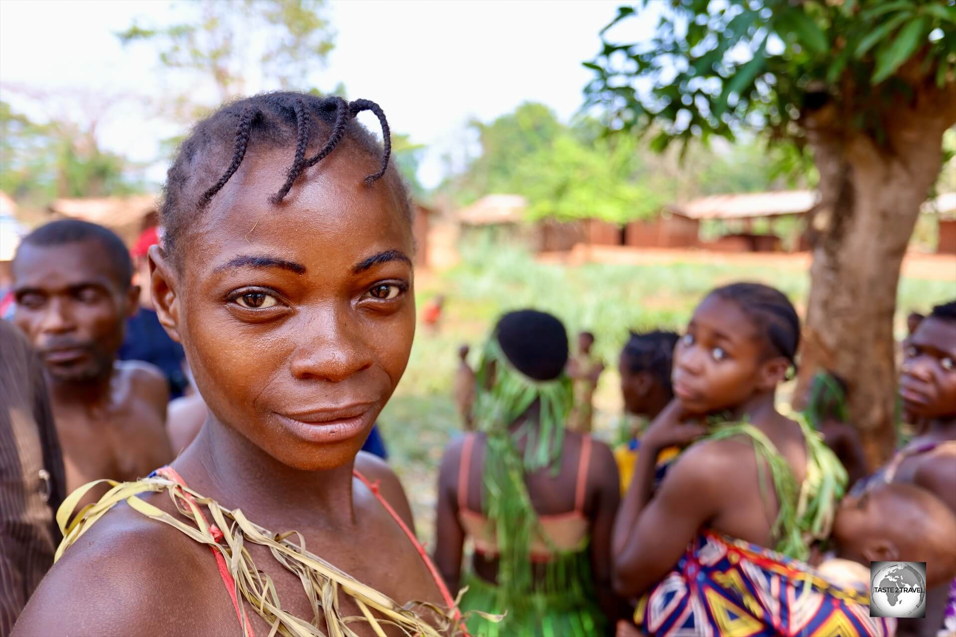 The Ata Pygmies gather to perform traditional song and dance for our group.