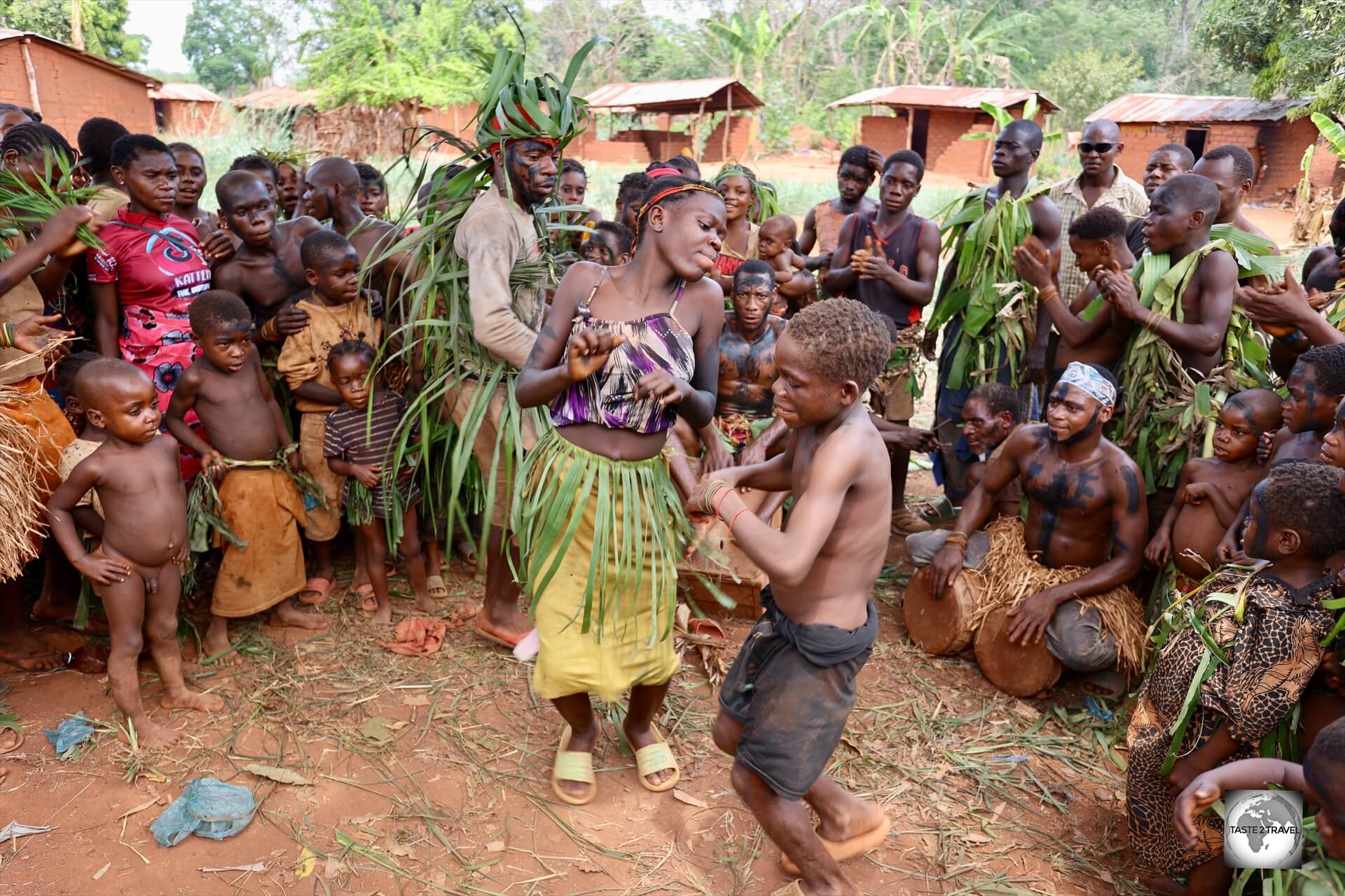 A tribe of Aka Pygmies perform for our group during a visit to their village at Kpèkèto in south-west Central African Republic.
