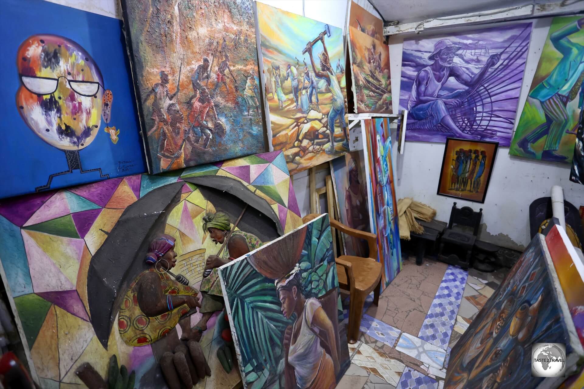 Paintings for sale at a craft market in Brazzaville.