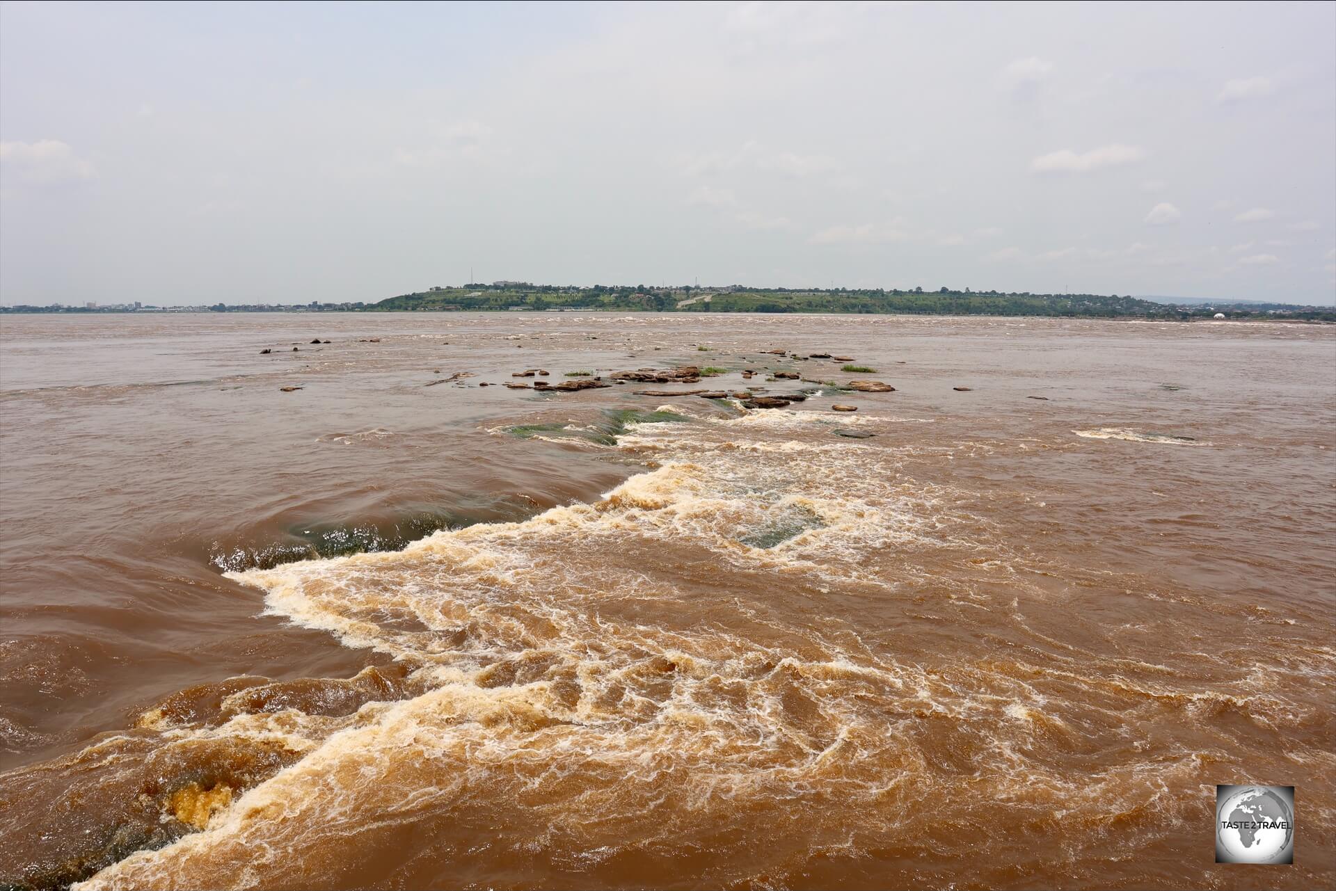 A view of the Congo River (with DRC on the opposite shore) from Bar Restaurant Les Rapides.