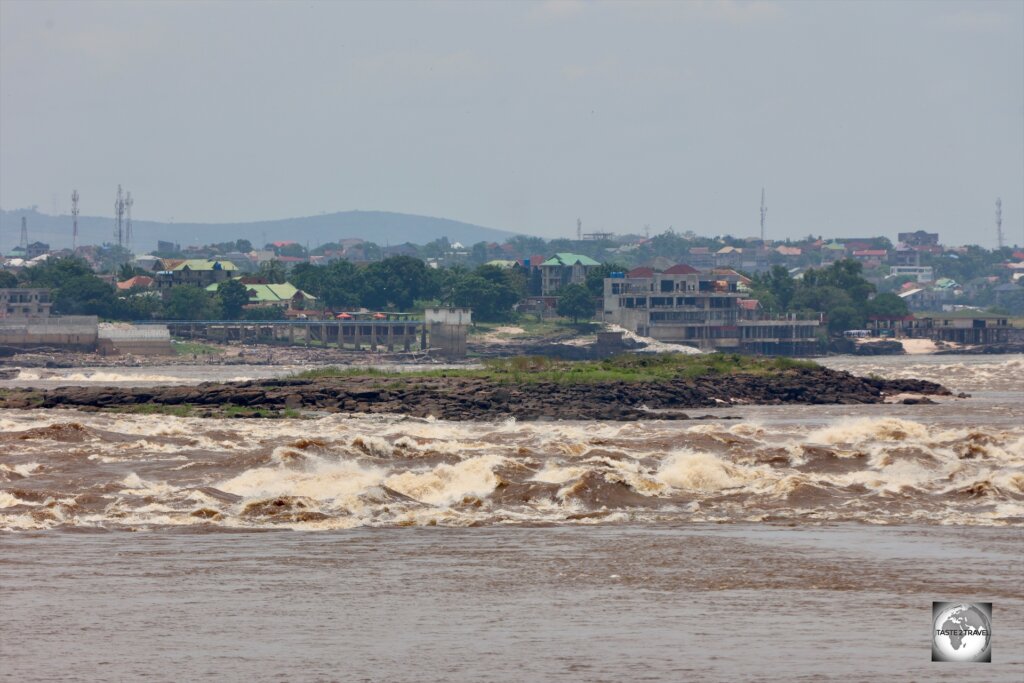 The Congo River seperates Brazzaville, the capital of the Republic of the Congo, from Kinshasa, the capital of the DRC, which can be seen in the distance.
