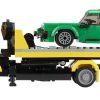 Holownik i zielony sportowy samochód z klocków pasujących do LEGO