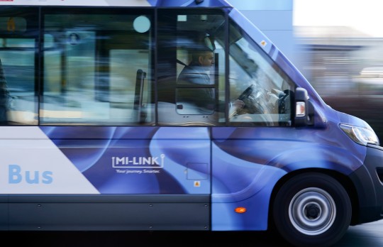 A safety driver sits in the driver's seat of the UK's first all-electric autonomous passenger bus as it drives around Milton Park, a business and science hub near Didcot, Oxfordshire, during it's launch event. The service will be operated by First Bus in and around Milton Park. Picture date: Monday January 23, 2023. PA Photo. See PA story TRANSPORT Bus. Photo credit should read: Andrew Matthews/PA Wire