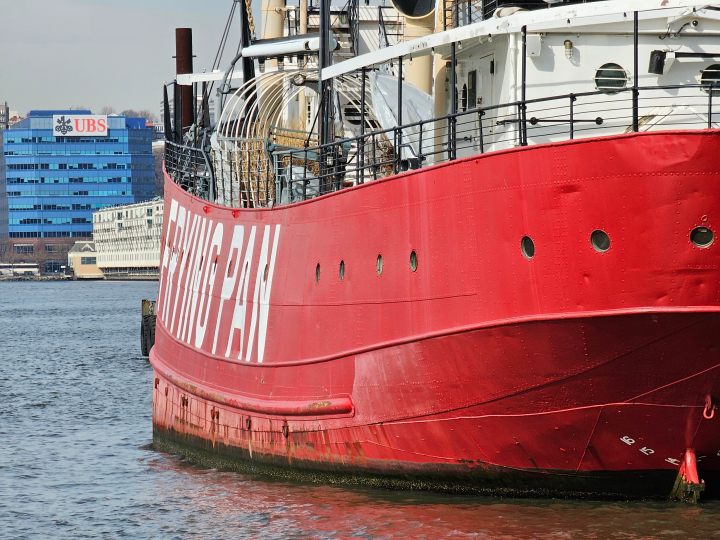 Galaxy S23 Ultra telephoto picture of a red boat on the water.