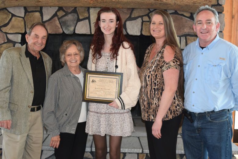 Morgan Blankenship, center, a senior at Hurley High School, was the winner of the $1,000 Kaye Rife-Gellman Scholarship awarded by the Buchanan County Chamber of Commerce. She is pictured here (from left) with Jay and Janice Rife, the scholarship donors; Blankenship; her mother, Luciana Blankenship and her father, Charles Blankenship.
