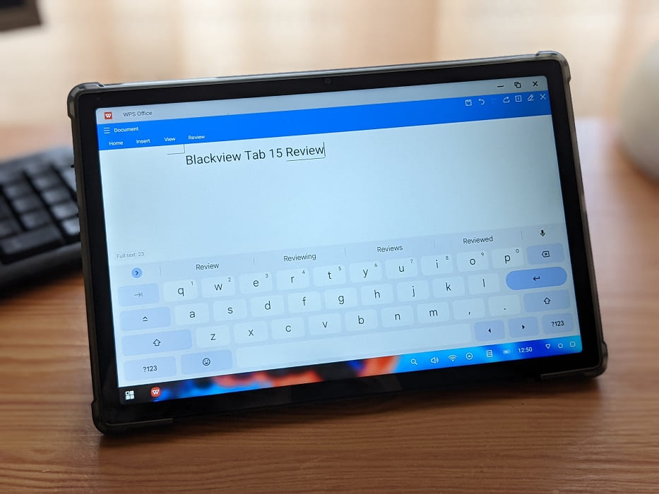 Typing on the Blackview Tab 15 tablet in PC mode.