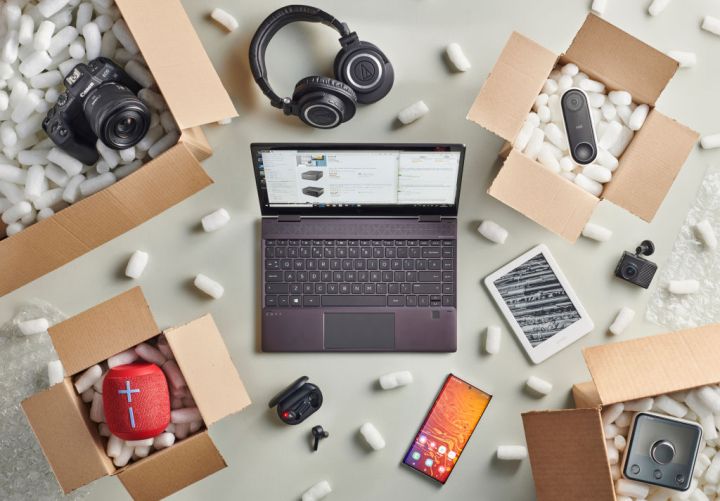 A collection of electronic gadgets out of their shipping boxes.