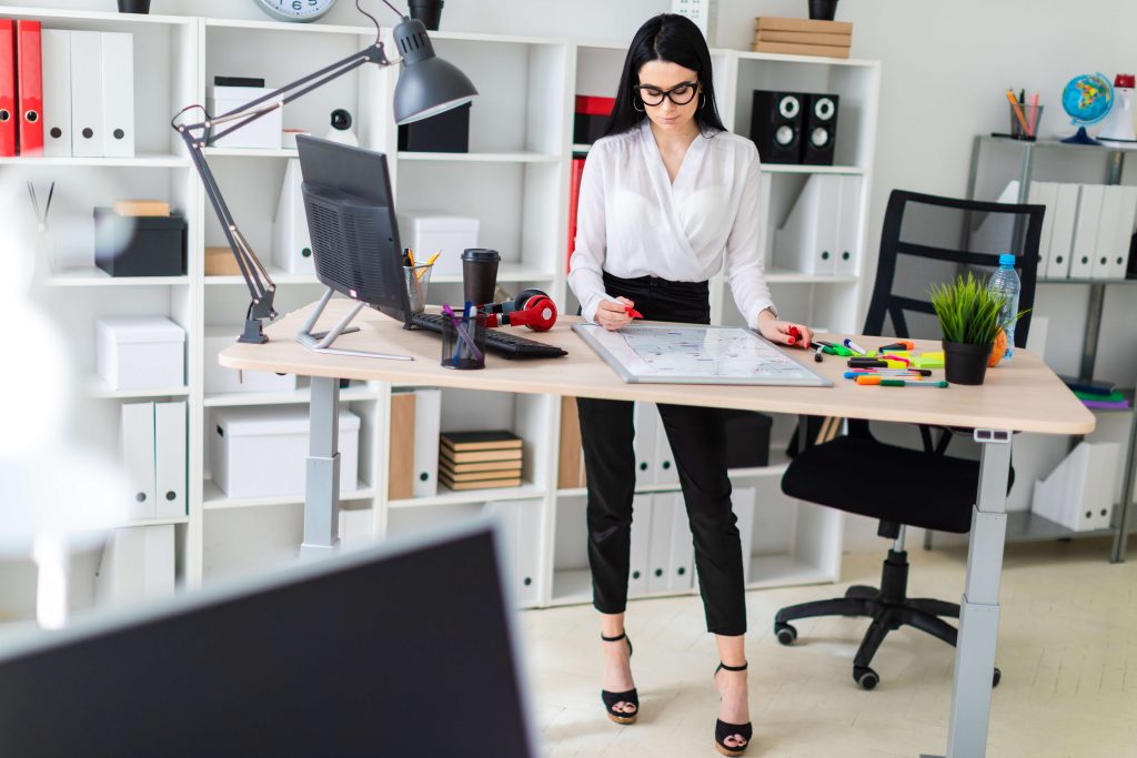 Automating Your Workday: The Benefits of Using a Standing Desk with Advanced Features