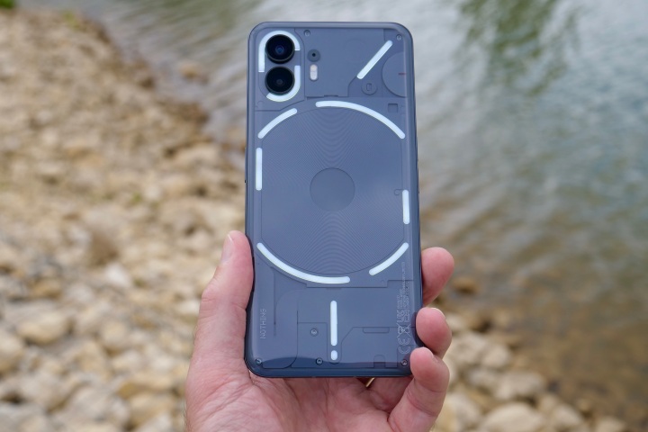 The back of the Nothing Phone 2, with the lights active.