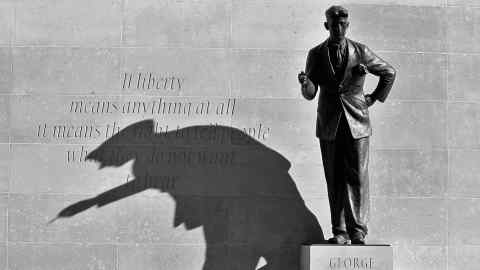 Statue of George Orwell casts a shadow outside BBC Broadcasting House