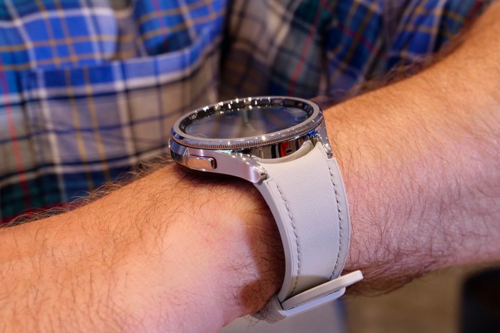 A person wearing the Samsung Galaxy Watch 6 Classic.