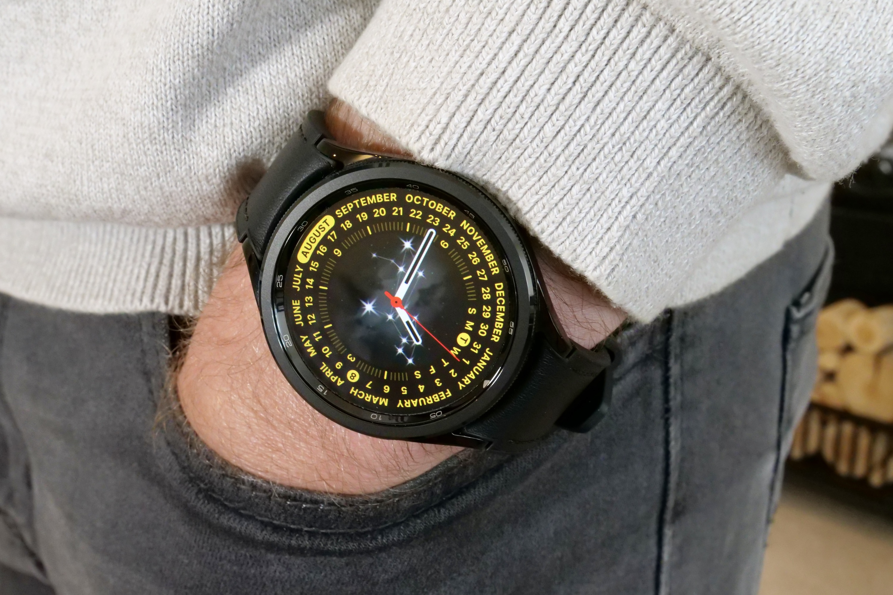 A person wearing the Samsung Galaxy Watch 6 Classic.