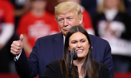 Sarah Huckabee Sanders, White House press secretary turned governor of Arkansas, appears with Donald Trump in Iowa in 2020.