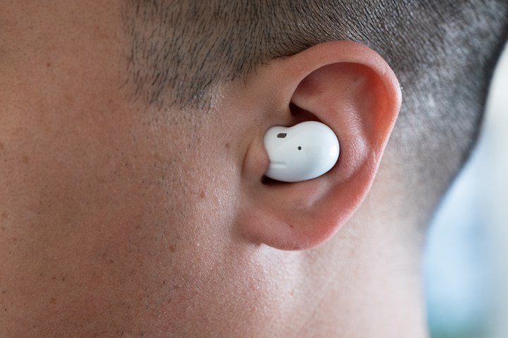 The Samsung Galaxy Buds Live, worn in an ear.