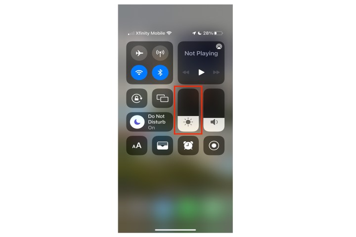 iOS Control Center brightness slider.