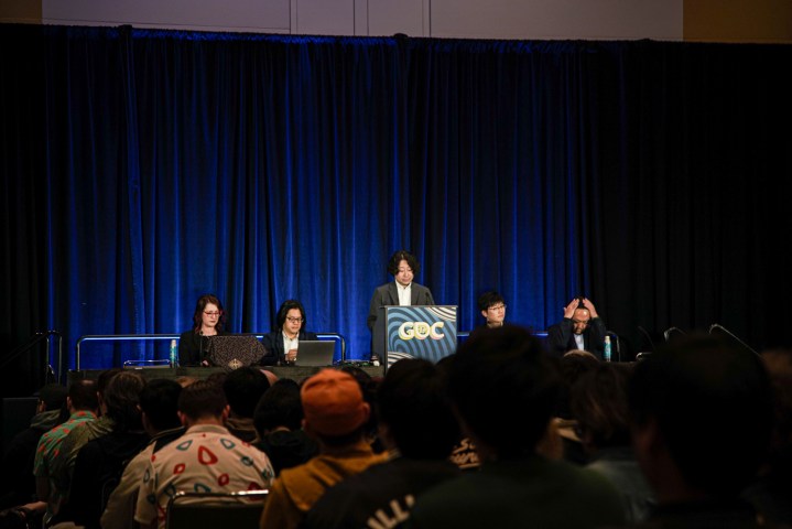 Nintendo developers giving a presentation at GDC.