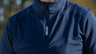 A close up of the G/FORE Brushed Back Tech Quarter Zip Pullover