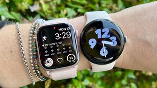 a photo of the Apple Watch 9 and Google Pixel Watch 2