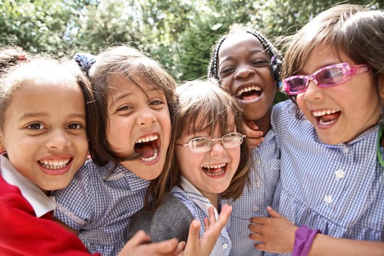 school girls laughing together