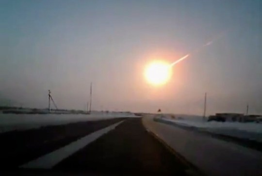 In this frame grab made from a video done with a dashboard camera, on a highway from Kostanai, Kazakhstan, to Chelyabinsk region, Russia, provided by Nasha Gazeta newspaper, on Friday, Feb. 15, 2013 a meteorite contrail is seen.