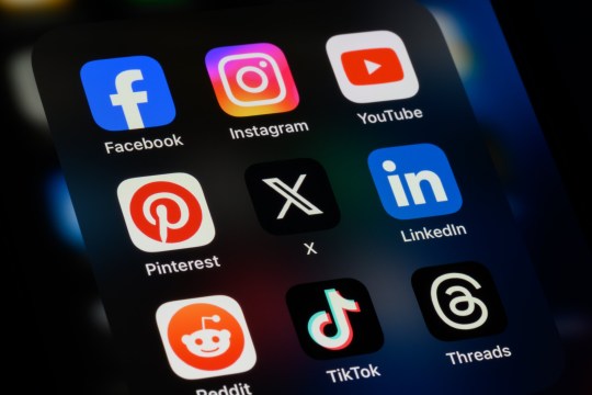 Toronto, Canada - September 24, 2023: Popular social media apps on an Apple iPhone: Facebook, Instagram, YouTube, Pinterest, X (formerly Twitter), LinkedIn, Reddit, TikTok, and Threads.